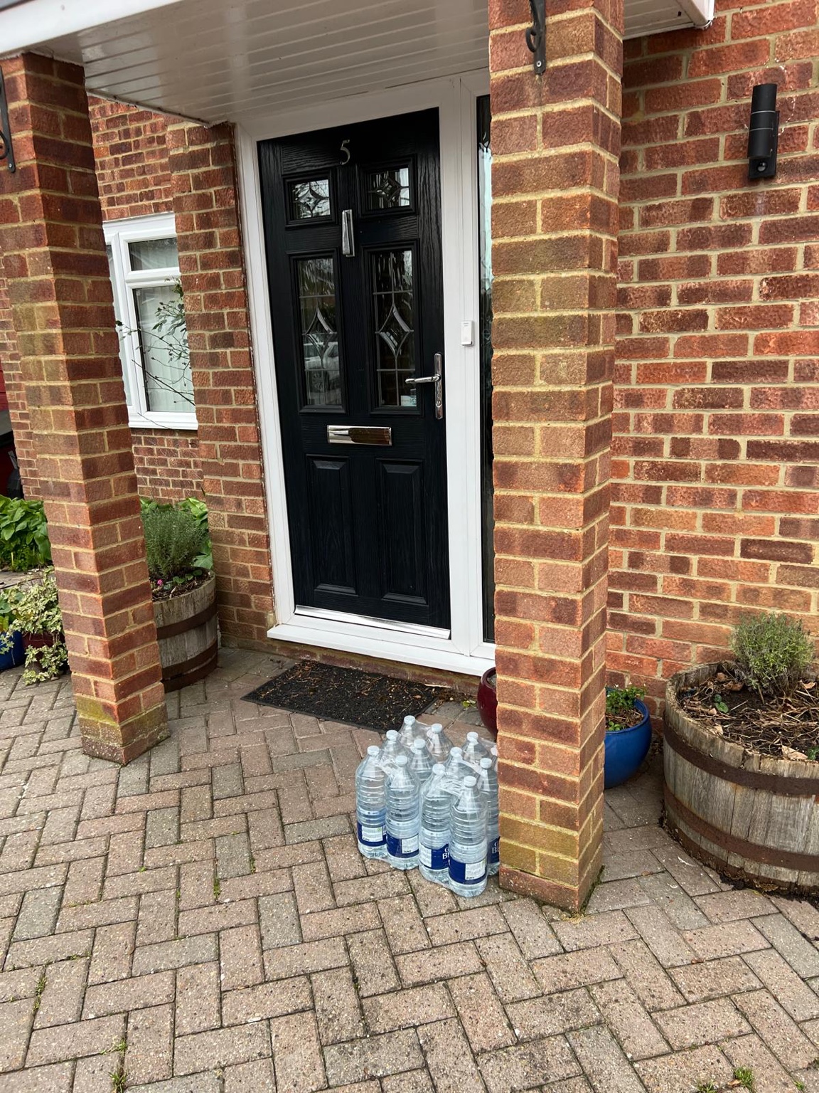 Multiple vans working during a water distribution operation